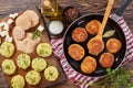 Crispy rice cutlets on a skillet