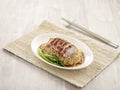 Crispy Roasted Irish Fat Duck Noodle with chopsticks served in a dish isolated on mat side view on grey background Royalty Free Stock Photo