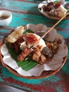 Crispy roasted pork and satay, Balinese traditional food