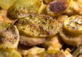 Crispy roasted potato with spicey on top Royalty Free Stock Photo