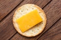 Crispy round cheese cracker from above. Royalty Free Stock Photo