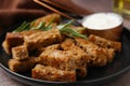 Crispy rusks with rosemary on plate, closeup Royalty Free Stock Photo