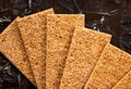 Crispy Rye Bread Crackers Gluten Free on a black background