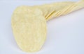 Crispy and salt potato chips on white background