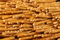 Crispy Salt Sticks with Sesame, Pretzel Sticks, Grissini or Breadsticks Royalty Free Stock Photo