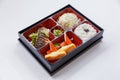 Crispy Skin Grilled Salmon Bento : Japanese Rice Served with Grilled Salmon, Kani and Tamagoyaki with Cabbage Salad.