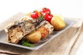 Crispy spiced mackerel with potatoes Royalty Free Stock Photo