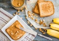 Crispy toast with peanut butter, bananas, breakfast, top view