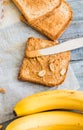 Crispy toast with peanut butter, bananas, breakfast