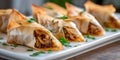 Crispy triangular savory pastries, phyllo dough, filled with rich mixture, fresh parsley garnish, elegant Royalty Free Stock Photo
