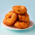 Crispy Uzhunnu Vada on Blue Background, Side Angle Royalty Free Stock Photo