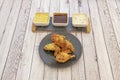crispy, well toasted broaster chicken spanish tapa with assorted sauces