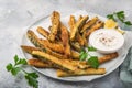 Crispy zucchini fries with garlic yogurt sause