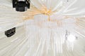 Cristal chandelier close-up. Beautiful banquet hall under a tent for a wedding reception. Interior of a wedding tent Royalty Free Stock Photo