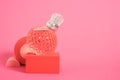 cristal glass perfume bottle on pink background copy space Royalty Free Stock Photo