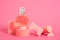 cristal glass perfume bottle on pink background copy space Royalty Free Stock Photo