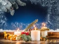 Cristmas candle lights and frozen window. Christmas background Royalty Free Stock Photo