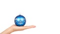 Cristmas decoration, glass blue ball in hand isolated on white background. New Year object. copy space, template Royalty Free Stock Photo