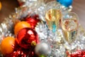 Cristmas glasses with champagne on cristmas decoration background Royalty Free Stock Photo