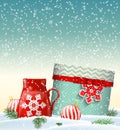 Cristmas greeting card with giftbox and red teacup