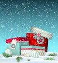 Cristmas greeting card with giftbox in snowdrift