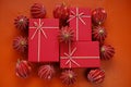 Cristmas presents.Merry Christmas. Surprises and gifts . Red boxes set and red Christmas balls on a red background