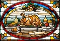 Stained glass. A dining table with typical Christmas foods and a beautiful roast turkey in the center Royalty Free Stock Photo