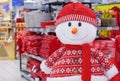 Cristmas soft toy of a snowman in a red sweater, scarf and hat Royalty Free Stock Photo