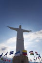 Cristo del Rey statue of Cali with world flags and blue sky, Col Royalty Free Stock Photo