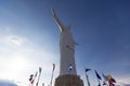 Cristo del Rey statue of Cali with world flags and blue sky, Col Royalty Free Stock Photo