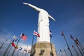 Cristo del Rey statue of Cali with world flags and blue sky, Col Royalty Free Stock Photo