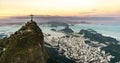 Cristo Redentor statue in Rio de Janeiro aerial shot during a spectacular sunset