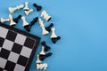 Critical thinking, winning chess tournament and mind game concept with chessboard and figures isolated on blue background with Royalty Free Stock Photo