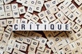 Critique word concept on cubes Royalty Free Stock Photo