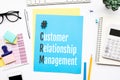 CRM,customer relationship management concepts with text on desk