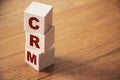 CRM, Customer Relationship Management on wooden blocks. Business concept Royalty Free Stock Photo