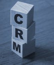 CRM, Customer Relationship Management on wooden blocks. Business concept Royalty Free Stock Photo