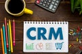 CRM. Customer Relationship Management. Tablet on the office Desk