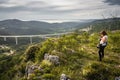 Crni Kal, Slovenia - May 25, 2019: woman admiring upper panoramic view on viaduct of crni kal, beside adriatic sea, slovenia