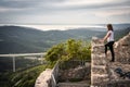 Crni Kal, Slovenia - May 25, 2019: woman admiring upper panoramic view on viaduct of crni kal, beside adriatic sea, slovenia