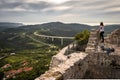 Crni Kal, Slovenia - May 25, 2019: woman admiring upper panoramic view on viaduct of crni kal, beside adriatic sea, slovenia