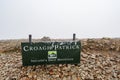 Croagh Patrick, Ireland - 07.15.2020: Sign Croagh Patrick Ireland holy mountain, white cloudy sky in the background Royalty Free Stock Photo