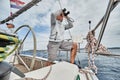 Croatia, Adriatic Sea, 19 September 2019: The brutal captain of the boat is at a steering wheel, he looks in the field