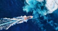 Croatia. Aerial view of luxury floating boat on blue Adriatic sea at sunny day. Fast boat on the sea surface. Seascape from drone. Royalty Free Stock Photo