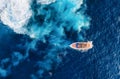 Croatia. Aerial view of luxury floating boat on blue Adriatic sea at sunny day. Yachts on the sea surface. Royalty Free Stock Photo