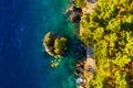 Croatia. Aerial view on rocks and forest. Vacation and adventure. Rocks and turquoise water. Royalty Free Stock Photo
