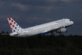 Croatia Airlines plane taking off from runway