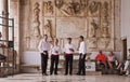 Croatia, Choir sing traditional music on a marble covered balcony