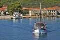 Croatia, dalmatian village and touristic boats