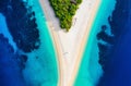 Croatia, Hvar island, Bol town. Aerial view at the Zlatni Rat beach. Famous place in Croatia. Summer seascape from drone. Royalty Free Stock Photo